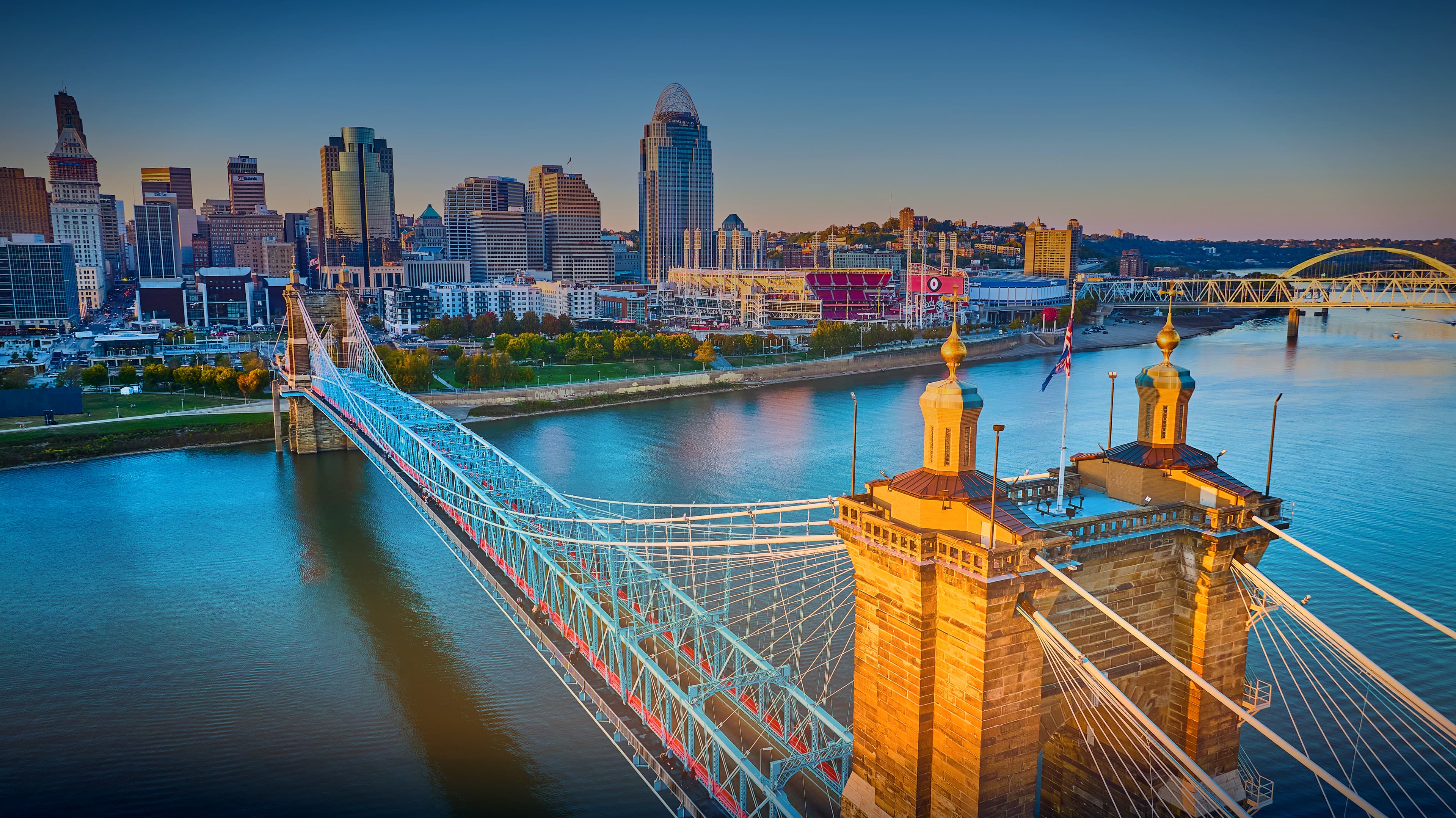 The Cincinnati skyline and Roebling Suspension Bridge at dusk